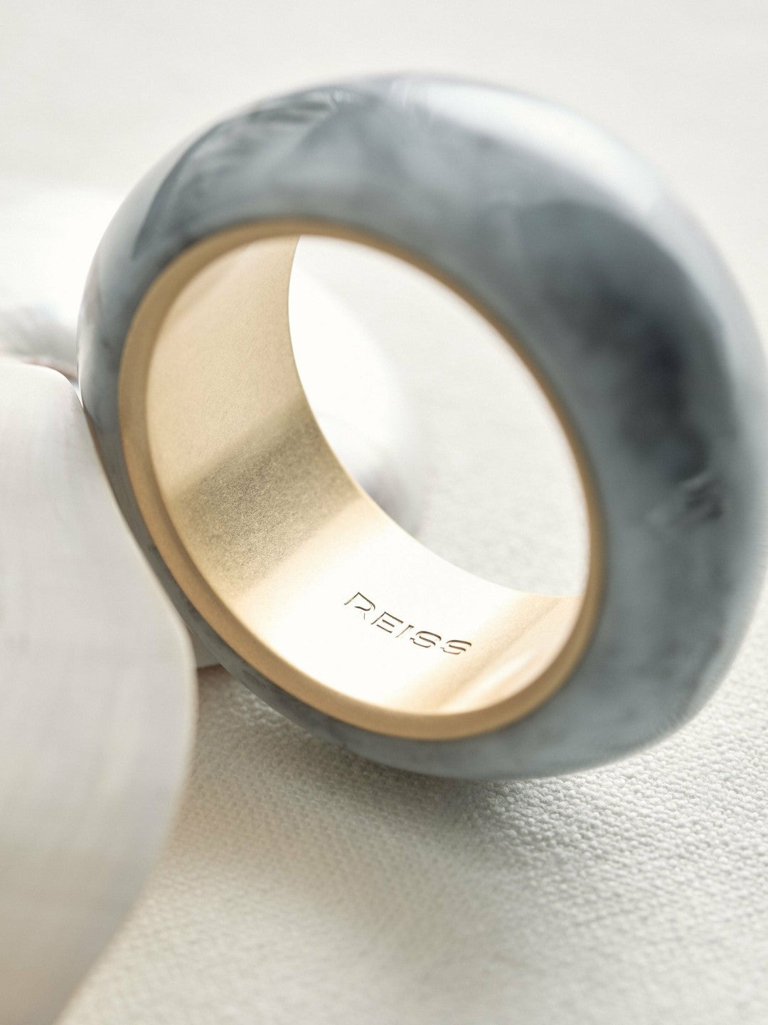 Reiss Curve Marble Bangle in Gold Tone