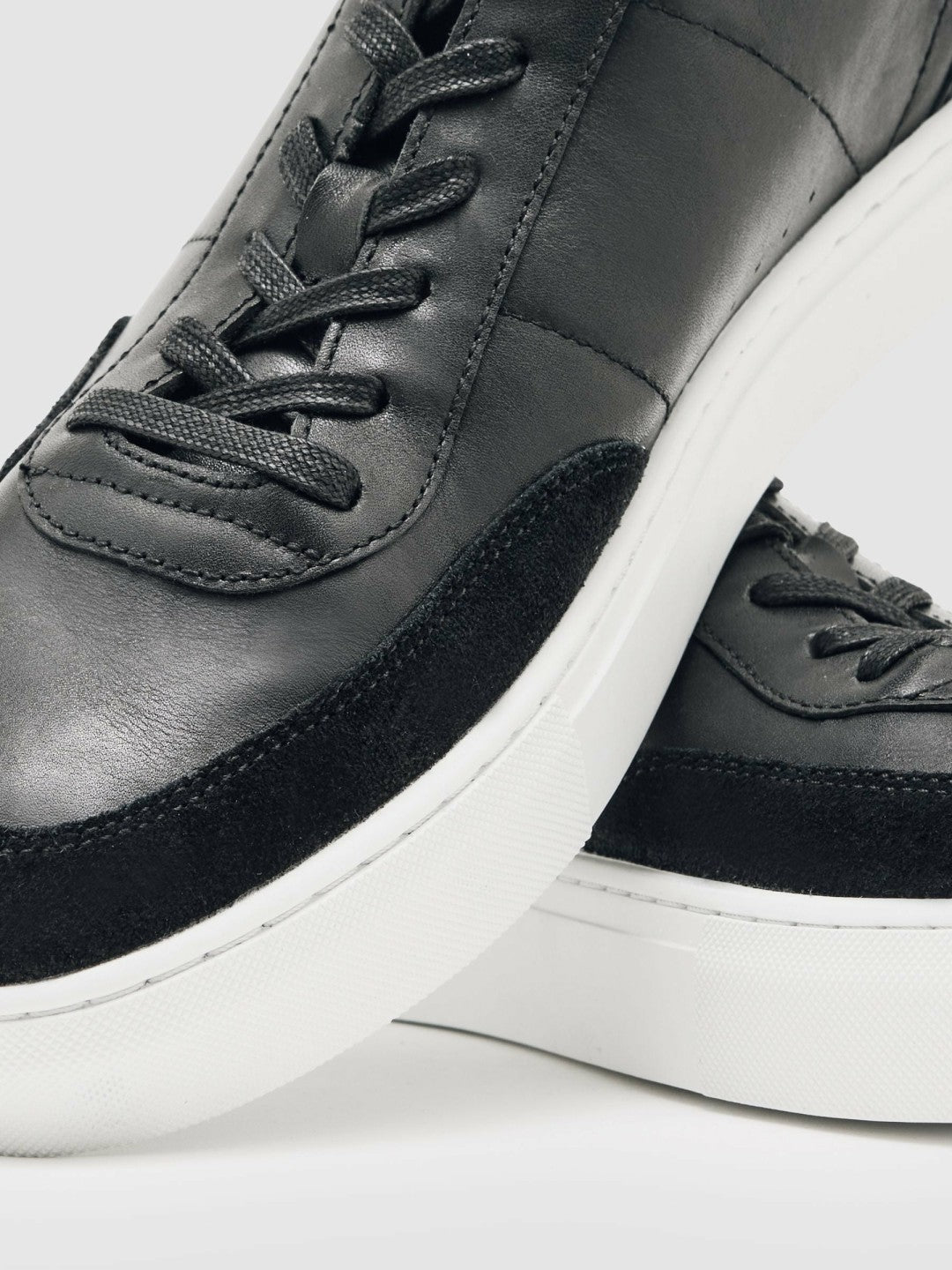 Reiss Bonded-Leather Low-Top Trainers in Black