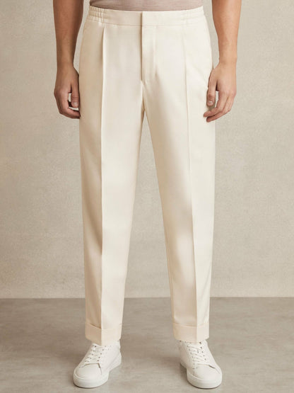 Reiss Relaxed-Fit Pleated Tapered Trousers in Ecru