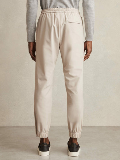 Reiss Featured - Drawstring Technical Cuffed Trousers in Stone