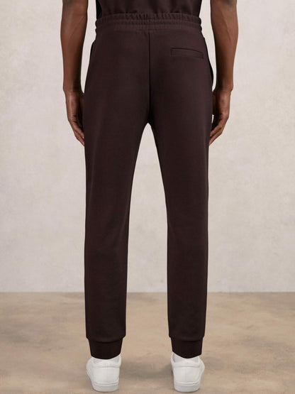 Reiss Interlock Drawstring Joggers in Cherry Red