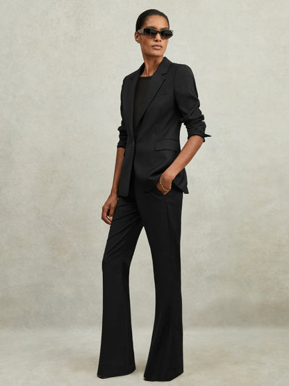 Reiss Wool-Blend Tailored Flared Suit Trousers in Black