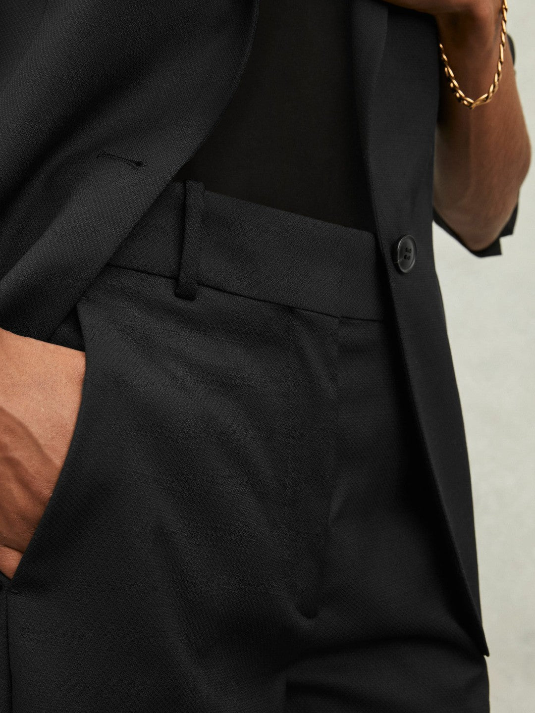 Reiss Wool-Blend Tailored Flared Suit Trousers in Black
