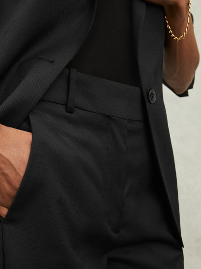Reiss Wool-Blend Tailored Flared Suit Trousers in Black