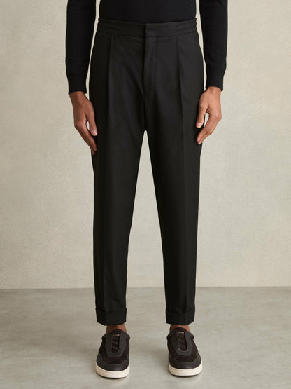 Reiss Relaxed-Fit Pleated Tapered Trousers in Black