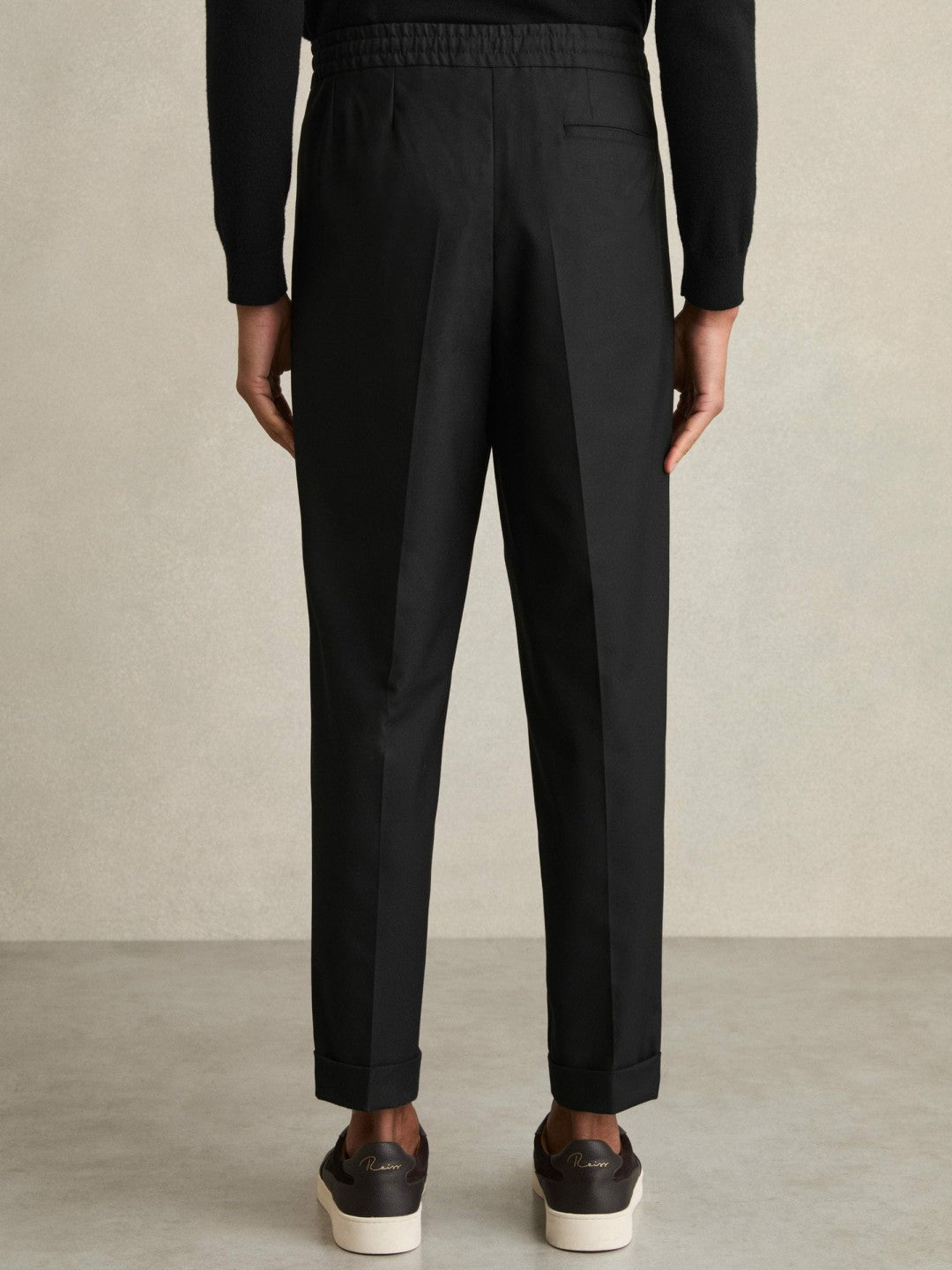 Reiss Relaxed-Fit Pleated Tapered Trousers in Black